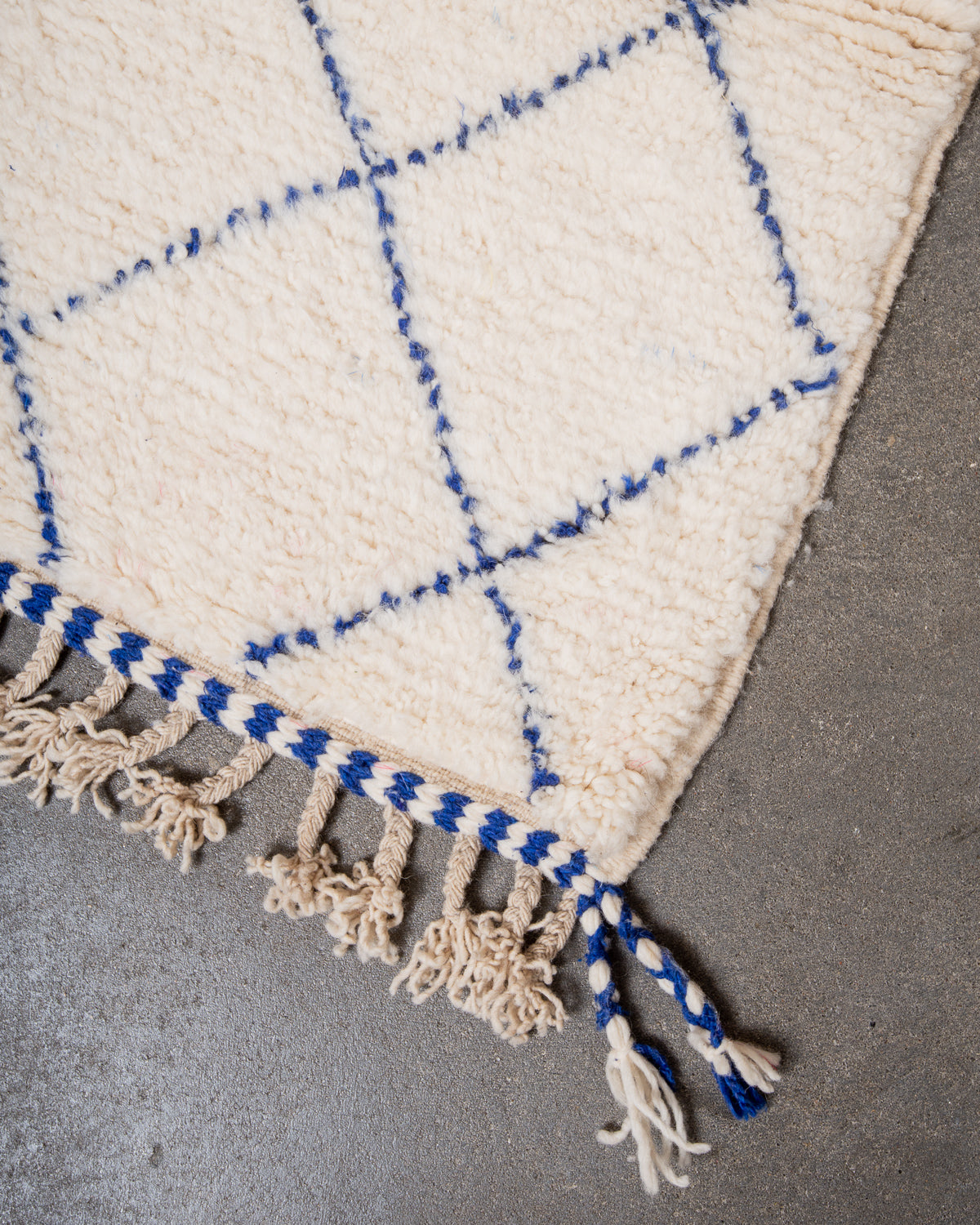 Modern, designer, handcrafted Berber rug from Morocco. Beniourain carpet with beautiful colours and patterns and fluffy wool texture.